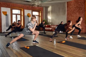 Group fitness classes at Nerul Gymkhana including yoga, Zumba, and strength training